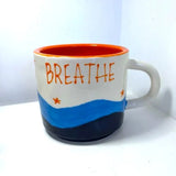 Bude Just Breathe Mug Orange | Budeful